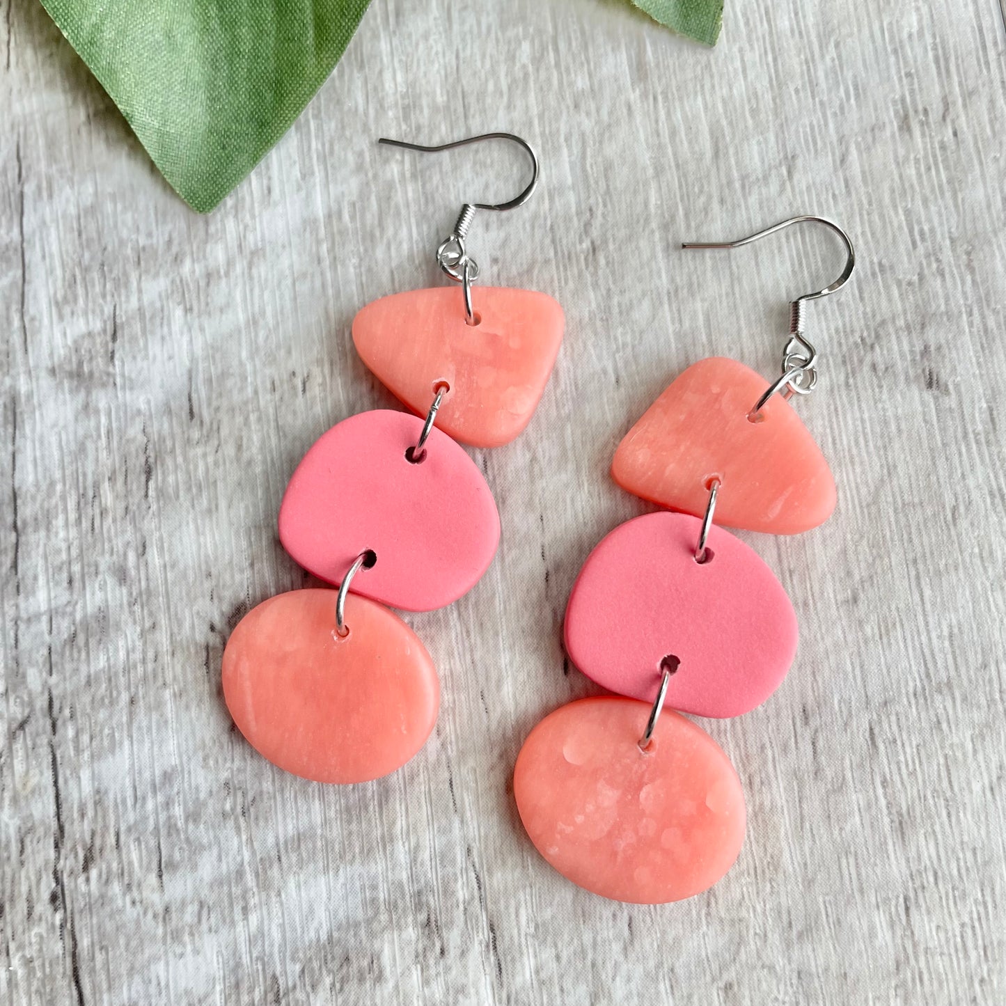 Handcrafted polymer clay dangle earring; lightweight, nickel free, and hypoallergenic.
Bud & Bugs earrings should avoid water, cleansers, and lotions.