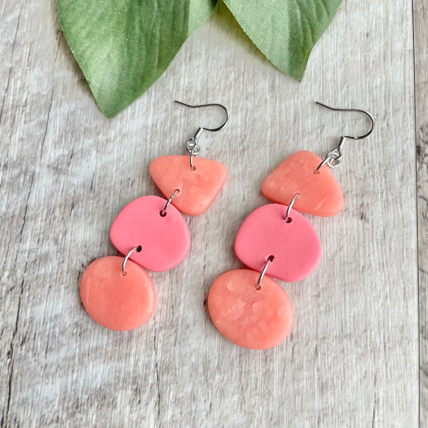 Handcrafted polymer clay dangle earring; lightweight, nickel free, and hypoallergenic.
Bud & Bugs earrings should avoid water, cleansers, and lotions.