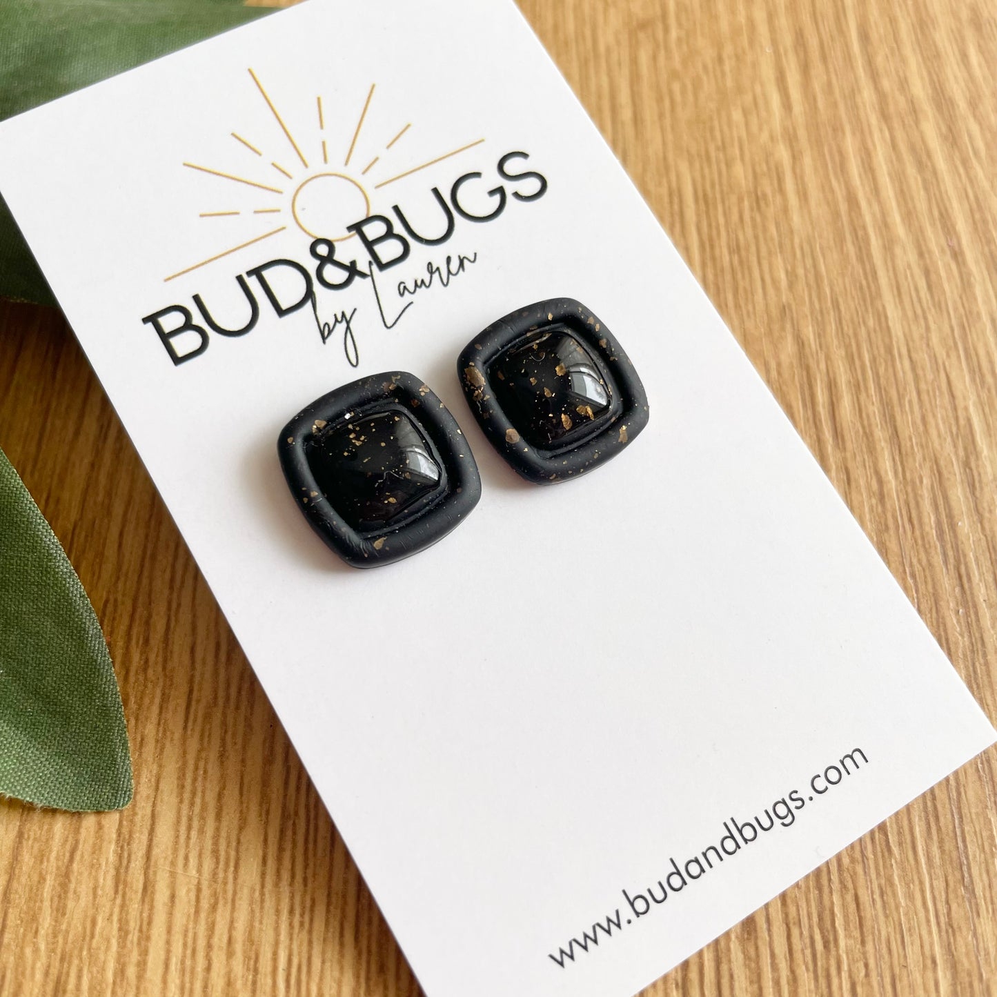 Black Stud with Gold Accent